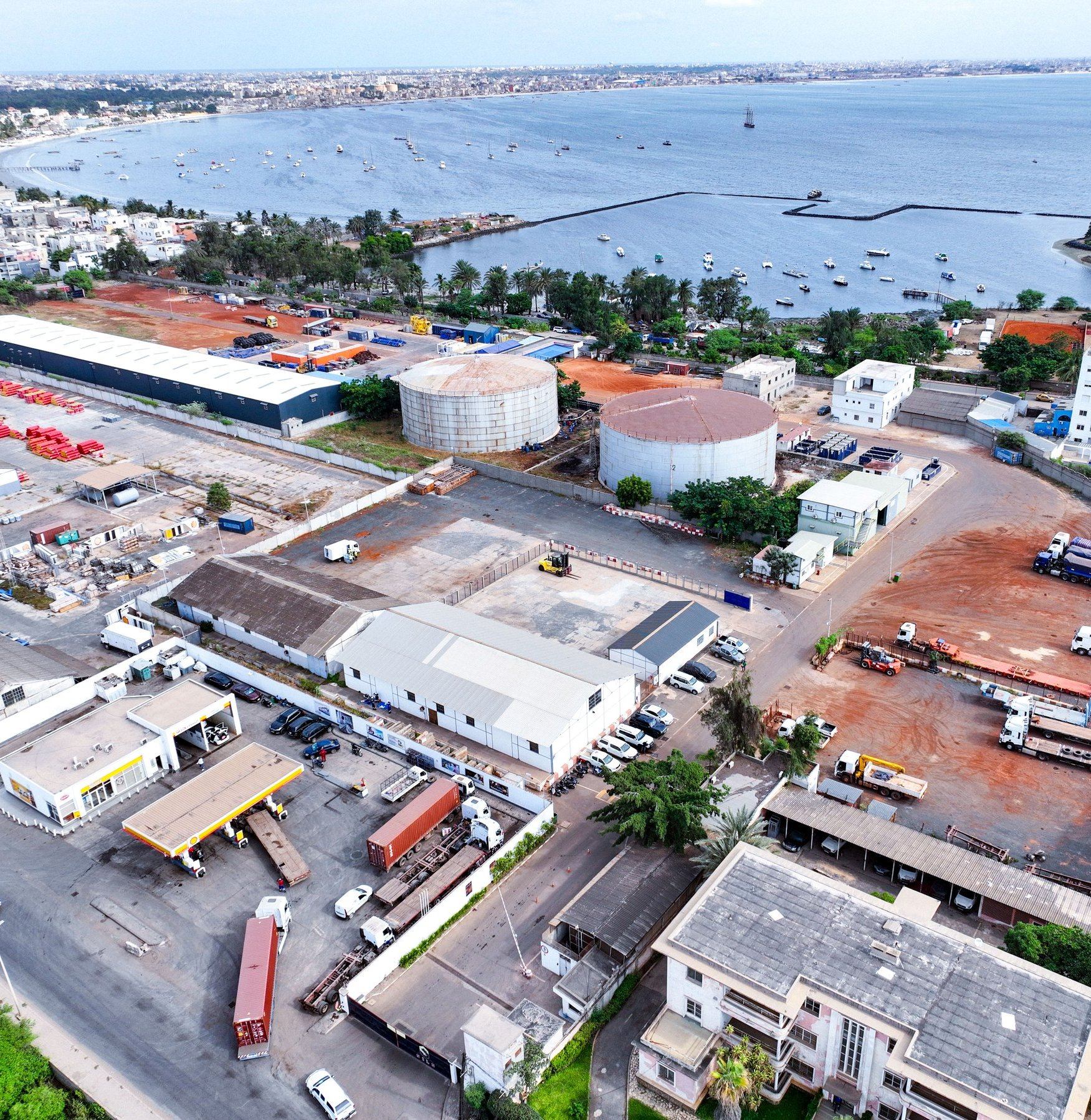 Aerial view of the 45,000 m² SILS base on Route des Hydrocarbures with the Bel Air waterfront beyond